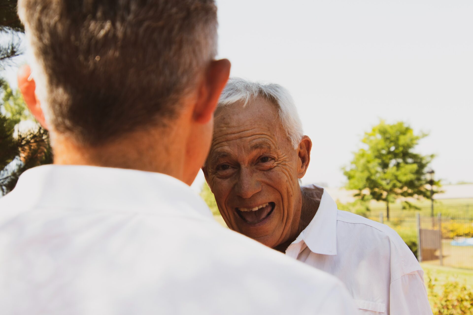 An Elder Man Talking With Joy